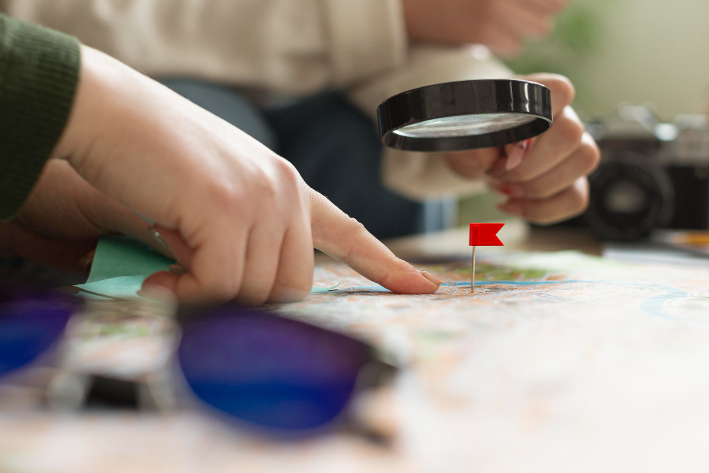 close-up-hand-having-magnifying-glass